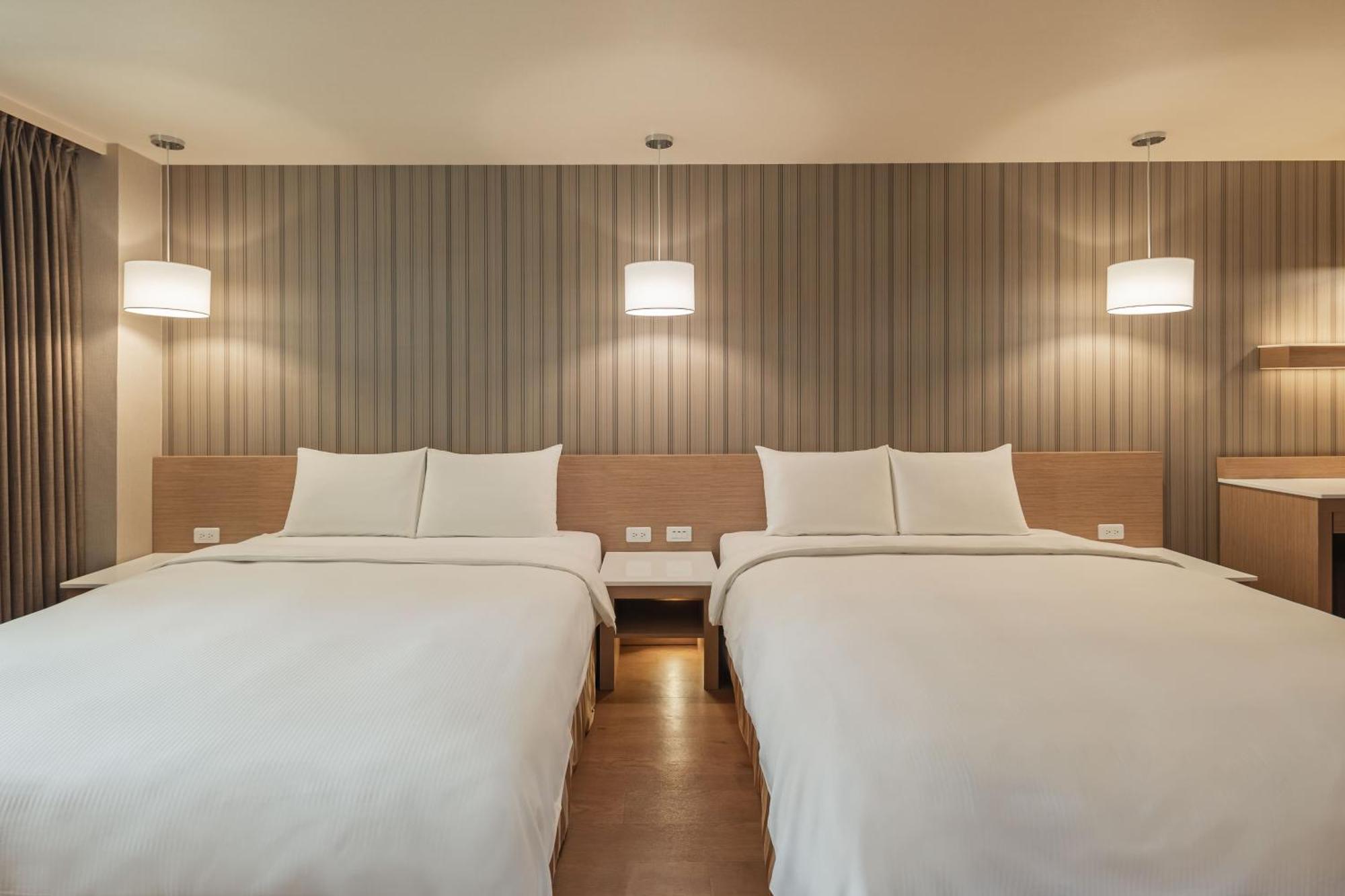 Kindness Hotel-Jue Ming Kaohsiung Zimmer foto