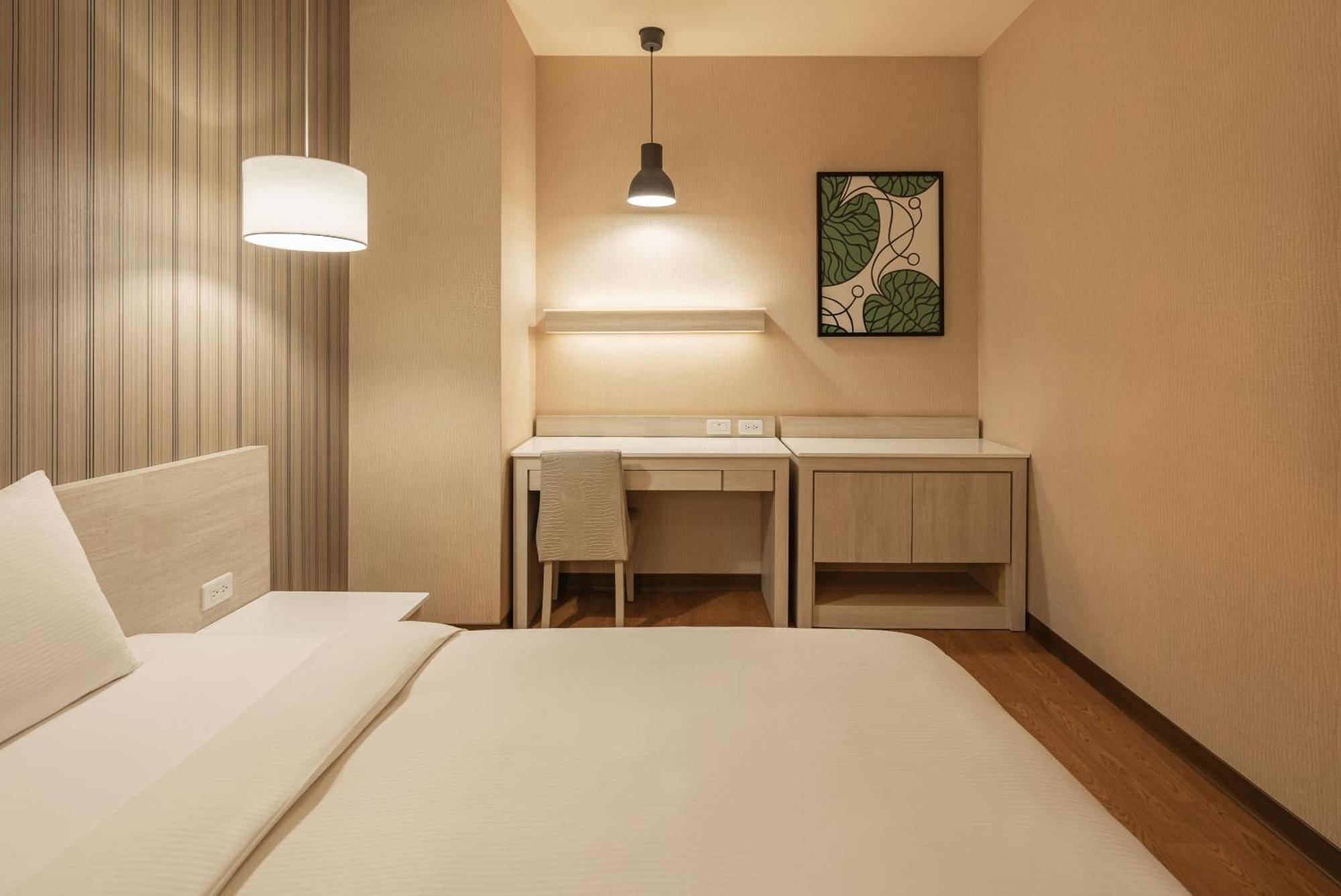 Kindness Hotel-Jue Ming Kaohsiung Zimmer foto