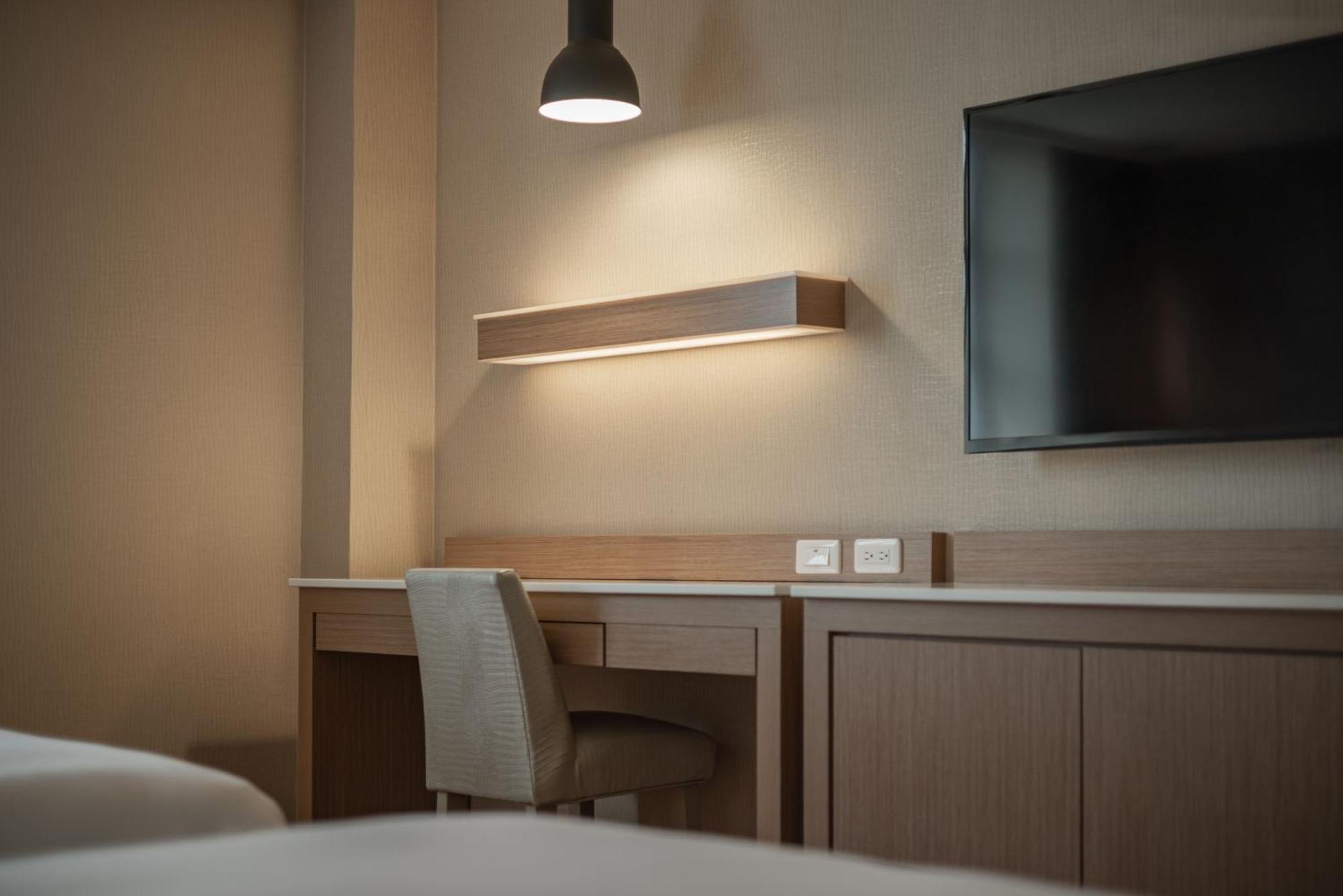 Kindness Hotel-Jue Ming Kaohsiung Zimmer foto