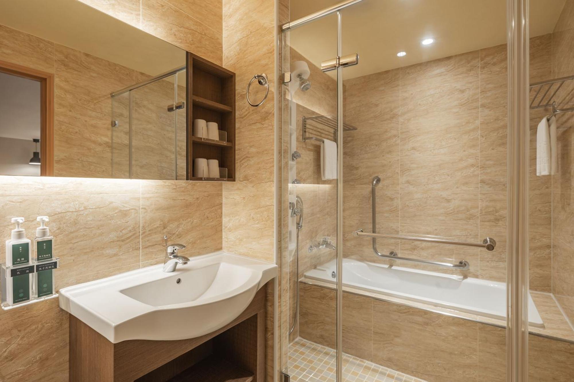 Kindness Hotel-Jue Ming Kaohsiung Zimmer foto