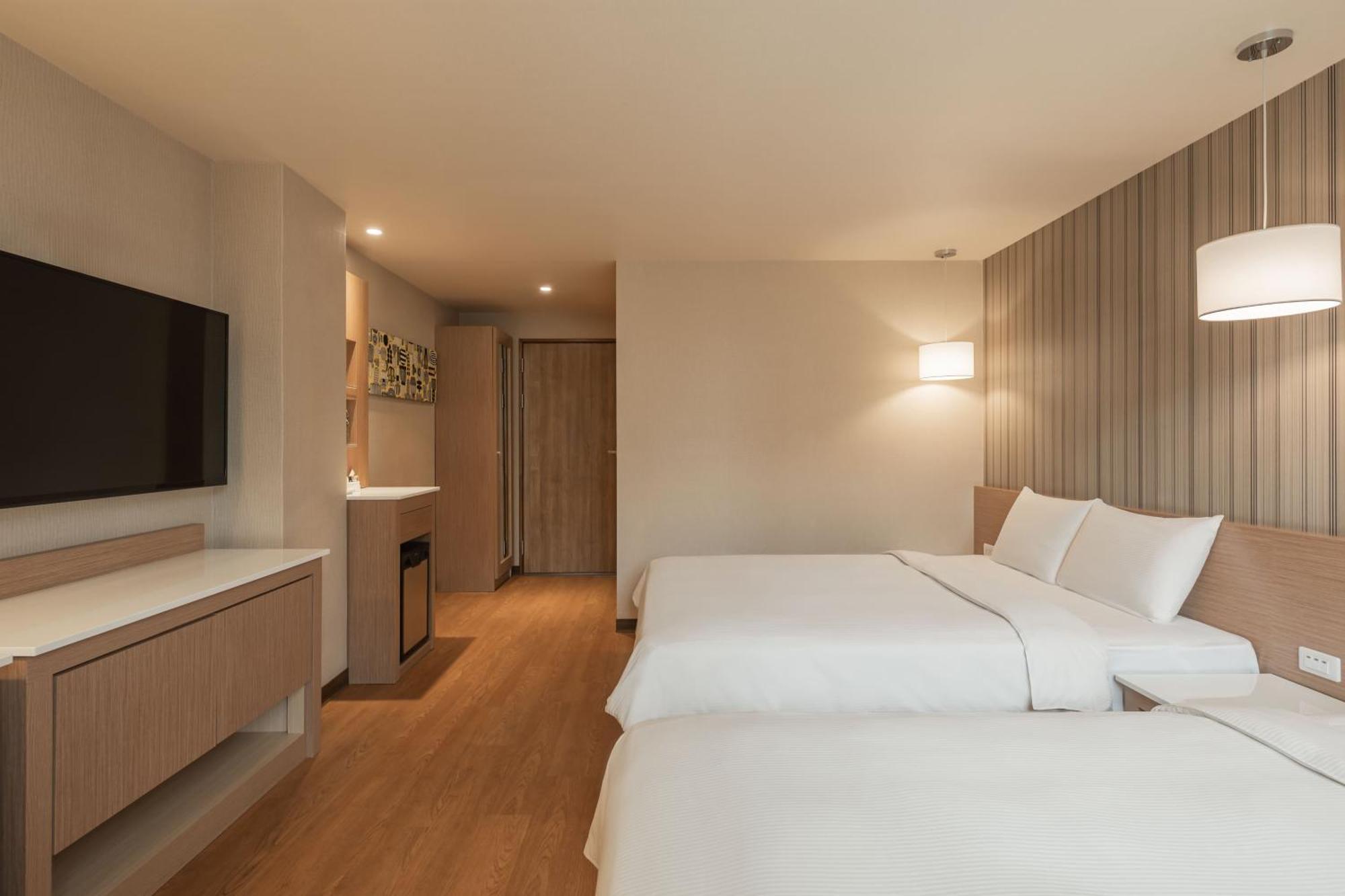 Kindness Hotel-Jue Ming Kaohsiung Zimmer foto