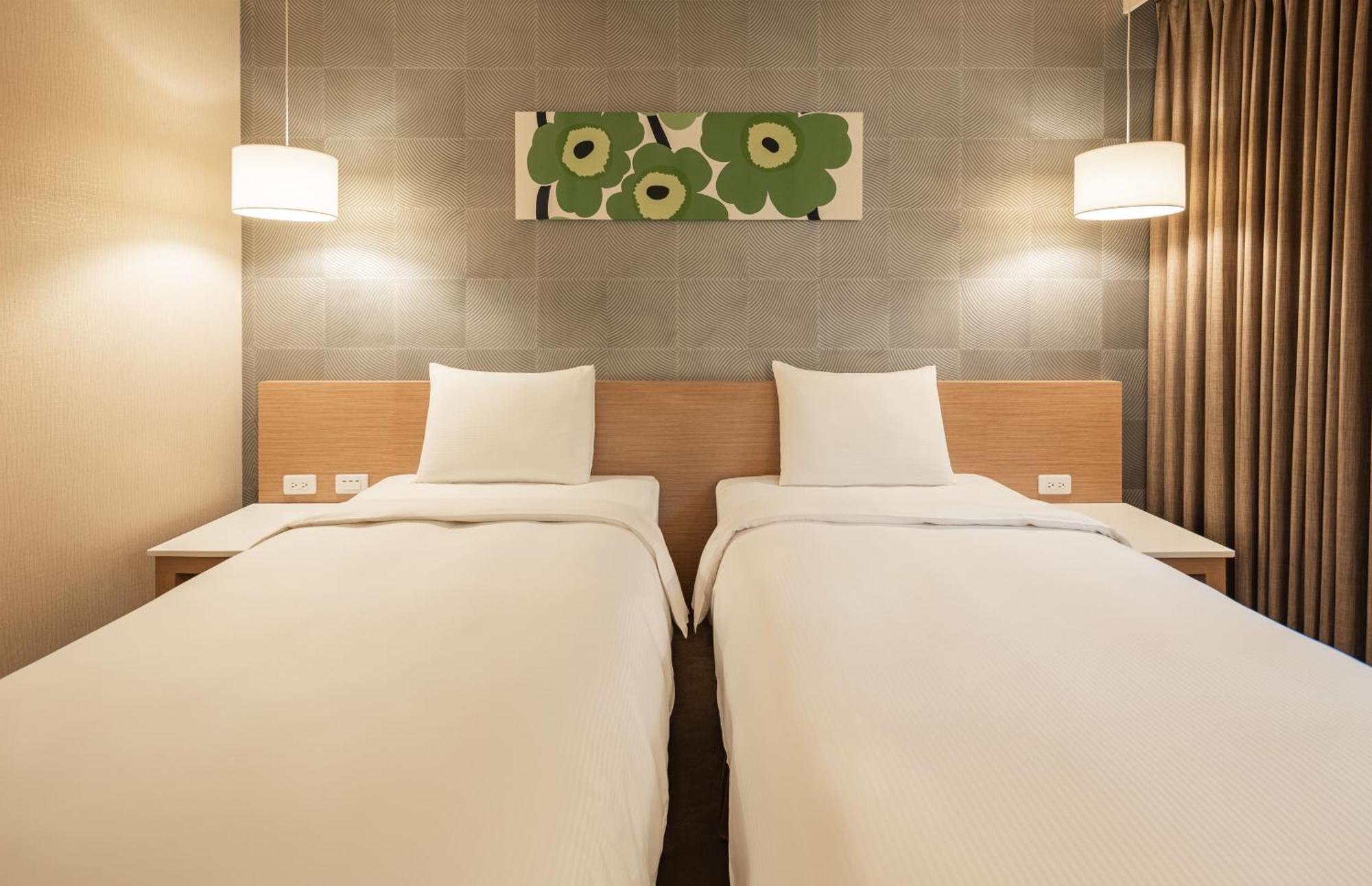 Kindness Hotel-Jue Ming Kaohsiung Zimmer foto