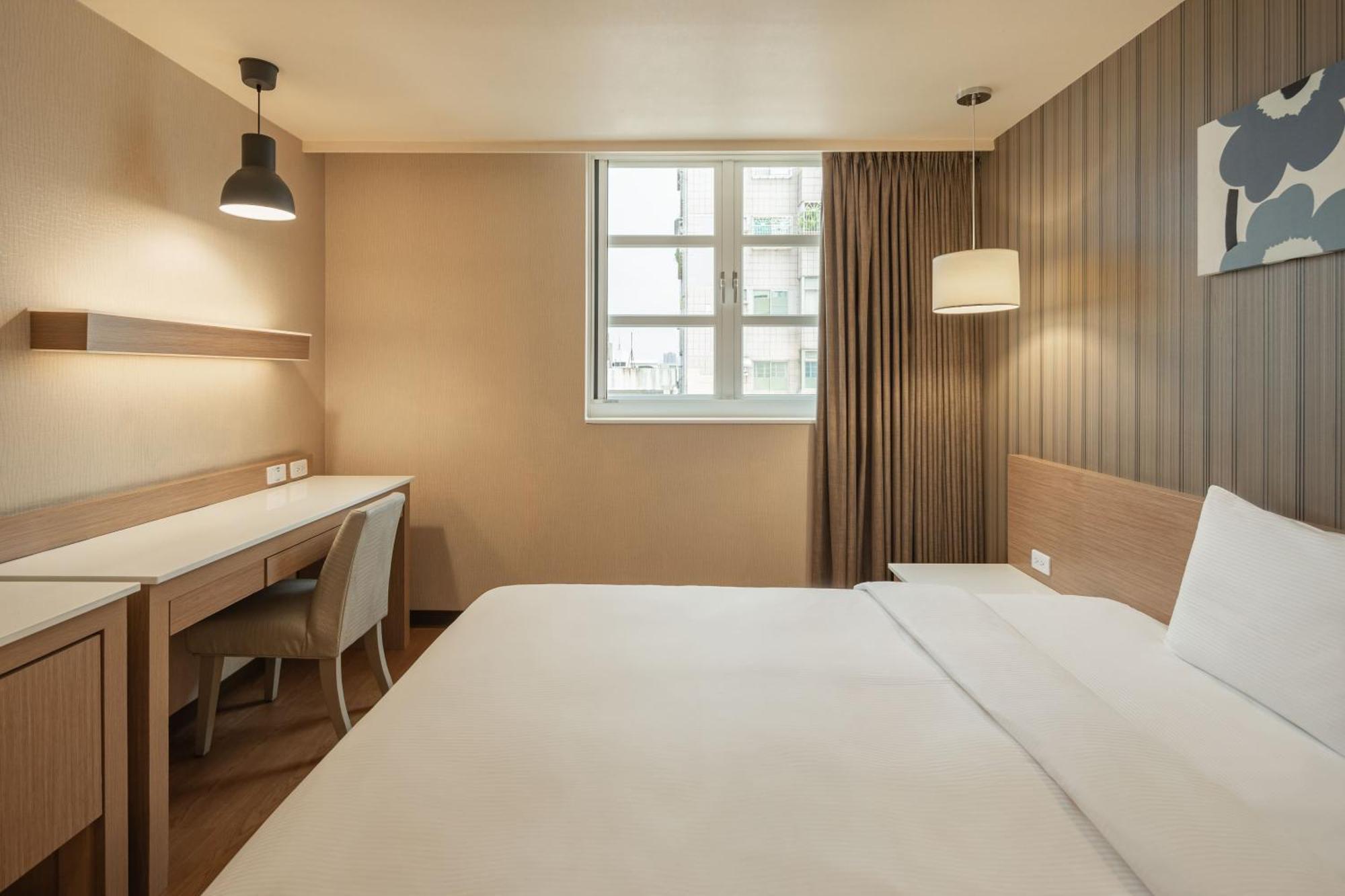 Kindness Hotel-Jue Ming Kaohsiung Zimmer foto